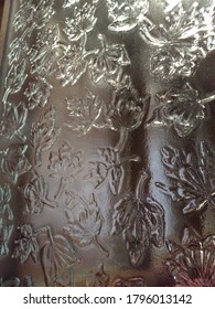 Glass Window Pane with Embossed Leaf Pattern Closeup