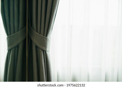 Glass Window With White Translucent Curtain.Close Up Sheer Curtain With Beautiful Sunlight In The Morning