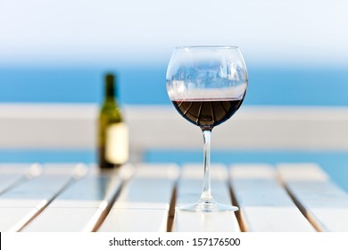 A Glass Of Wine At The Beach, Standing On A Footbridge In The South Pacific