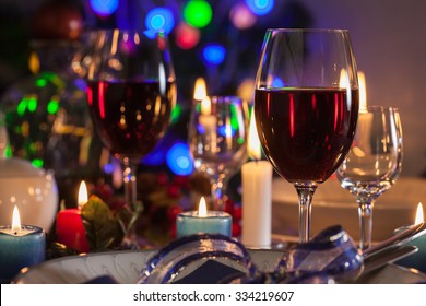 Glass Of Wine On The Christmas Table. Shallow Depth Of Field