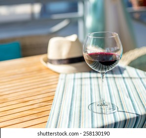 Glass Of Wine On The Table In Cafe