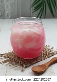 A Glass Of Young Coconut Ice Mixed With Red Syrup