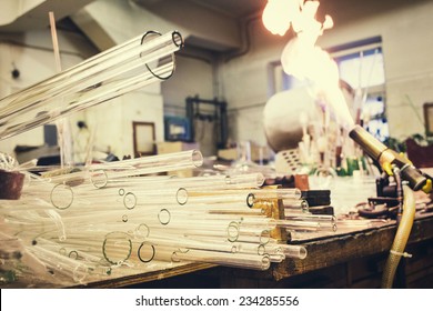 Glassblower products laboratory equipment and glass abstract background. Work place chemistry glass  - Powered by Shutterstock