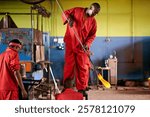 Glassblowers, glow and people in factory with heating equipment for professional craft production. Labor, workshop or men shaping object with tools for metalwork, manufacturing and forge for molding