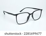 glasses with black frames on white background 