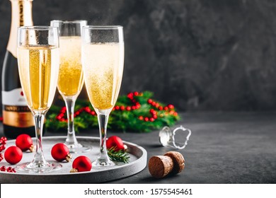 Glasses Of Champagne Or Prosecco. Christmas And New Year Holidays Background, Copy Space.