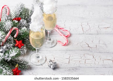 Glasses Of Champagne Or Prosecco With Cotton Candy. Christmas Or New Year Festive Drink