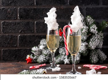 Glasses Of Champagne Or Prosecco With Cotton Candy. Christmas Or New Year Festive Drink