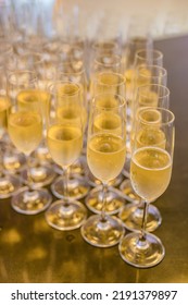 Glasses of champaign bubbles served on a table close up