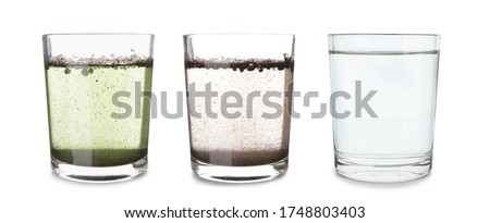 Glasses with clean and dirty water on white background