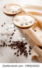 Glasses Of Coffee Martini On Light Background