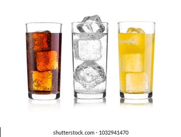 Glasses Of Cola And Orange Soda Drink And Lemonade Sparkling Water On White Background With Ice Cubes