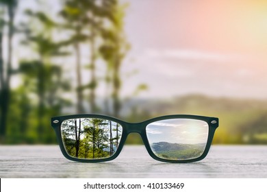glasses focus background wooden - stock image - Shutterstock ID 410133469