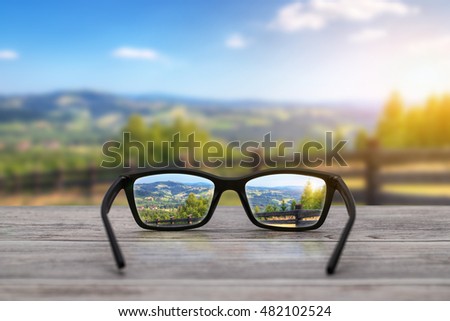 glasses focus background wooden - stock image