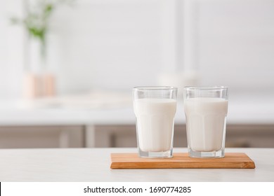 Glasses Of Fresh Milk On Table