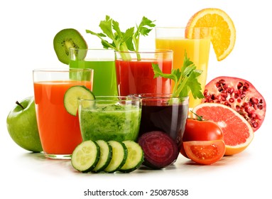 Glasses with fresh organic vegetable and fruit juices isolated on white. Detox diet.