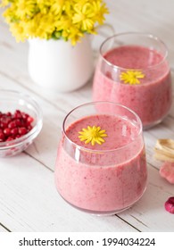 Glasses with frozen cranberry smoothie. Healthy and nutritious milkshake. A delicious drink for a weight loss diet. Vegan and vegetarian plant-based sugarless morning breakfast for flat belly.