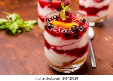 Glasses With  Fruit And Berry Parfait For Dessert