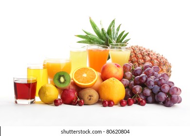 Glasses Of Fruit Juice With Fruits On A White Background