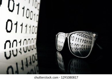 Glasses Hacker attack the server in the dark, use binary code.
