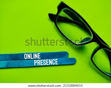 Glasses with ice cream sticks. The concept of the word Online Presence.