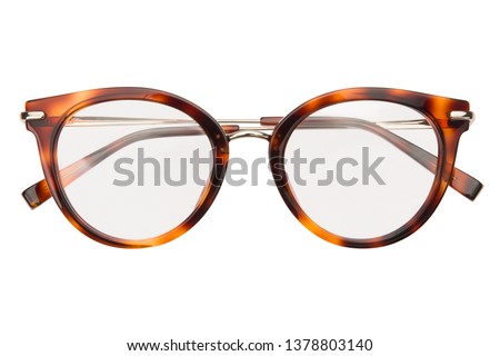 Glasses isolated on white background. Front view leopard color glasses reading transparent in round frame, business or office style.