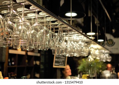 Glasses Left To Dry Upside Down In A High Class Bar