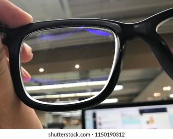 The glasses with the lens are scratched. Make eye and eye health is not good. - Shutterstock ID 1150190312