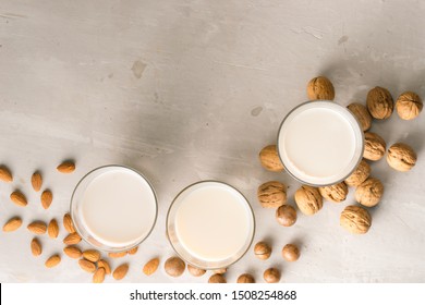 Glasses of milk: Macadamia, almond, walnut. Top view. - Shutterstock ID 1508254868