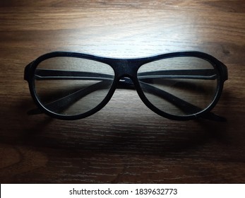 glasses on a dark wood background - Shutterstock ID 1839632773