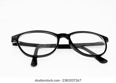 glasses on display on a table at an optician shop no people on white background stock image stock photo - Shutterstock ID 2381037267