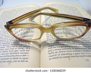 Glasses On Open Book Symbolying Reading Stock Photo Edit Now