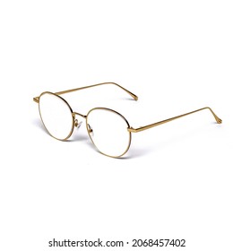 Glasses With Optical Lenses In A Thin Metal Frame Of Gold Color Isolated On A White Background Close-up.
