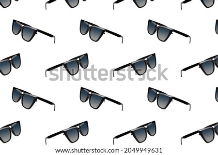 Glasses pattern background. Black cat eye sunglasses isolated on white.