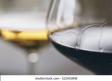 Glasses Of Red And White Wine Close Up