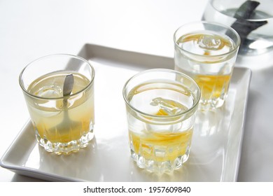 Glasses For Refreshing Summer Lemon, Yuzu Juice, Water. White Background