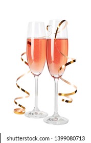 Glasses Of Rose Champagne With Gold Streamer Isolated On White