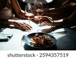 Glasses of rose wine seen during a friendly party or a celebration in a restaurant of a bar.
