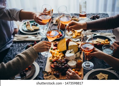 Glasses of rose wine seen during a friendly party of a celebration. - Shutterstock ID 1473598817