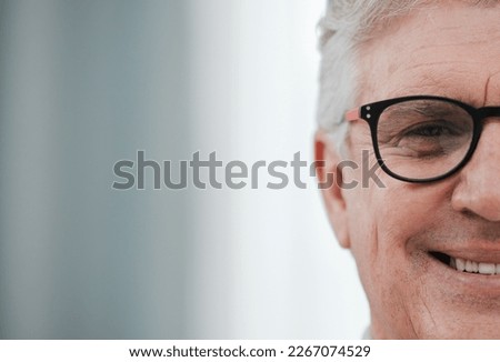 Glasses, senior smile and face portrait of a elderly man with mock up from vision check. Happy old person, retirement and nursing home resident feeling gratitude, happiness and relax in a house