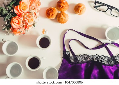 glasses for sight. silk and lace. Underwear. bouquet of roses. hot espresso. morning