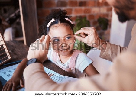 Glasses, smile and a child with a father and homework in a house with help and education. Happy, family and a father with eyewear for a girl kid during homeschool work, learning and teaching