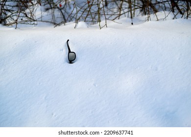 Glasses In A Snowdrift. Lost Eyeglasses. Winter Landscape. Selective Focus.