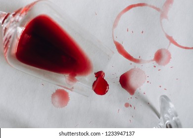 Glasses Of Spilled Red  Wine  On White  Background,  Copy Space.  Wine Degustation Concept