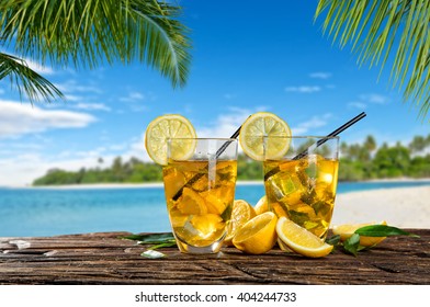 Glasses Of Summer Ice Tea Drink On Beach