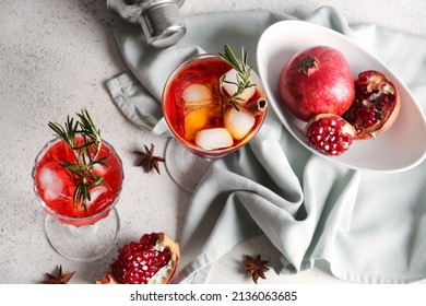 Glasses Of Tasty Pomegranate Cocktail On Table