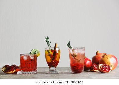 Glasses Of Tasty Pomegranate Cocktail On Table