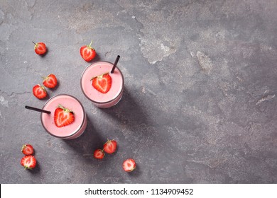 Glasses With Tasty Strawberry Smoothie On Table, Top View