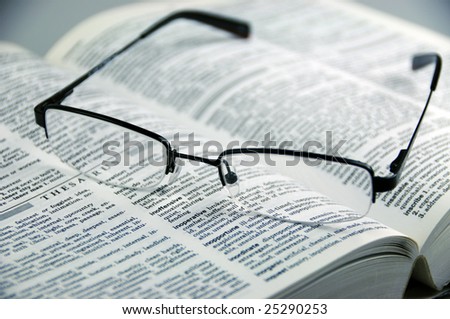 glasses with thesaurus and dictionary