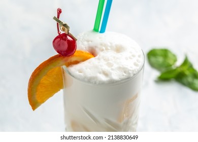 Glasses With Vanilla Milk Shakes, Milk Cocktail, Vanilla Ice Cream Milk Shake. Banana Smoothie With Mint And Vanilla,